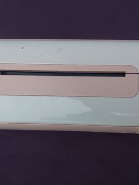 Compact White and Pink Desktop Electronic Paper Cutter